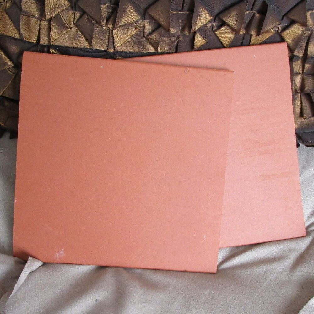 pair of terra cotta tiles
